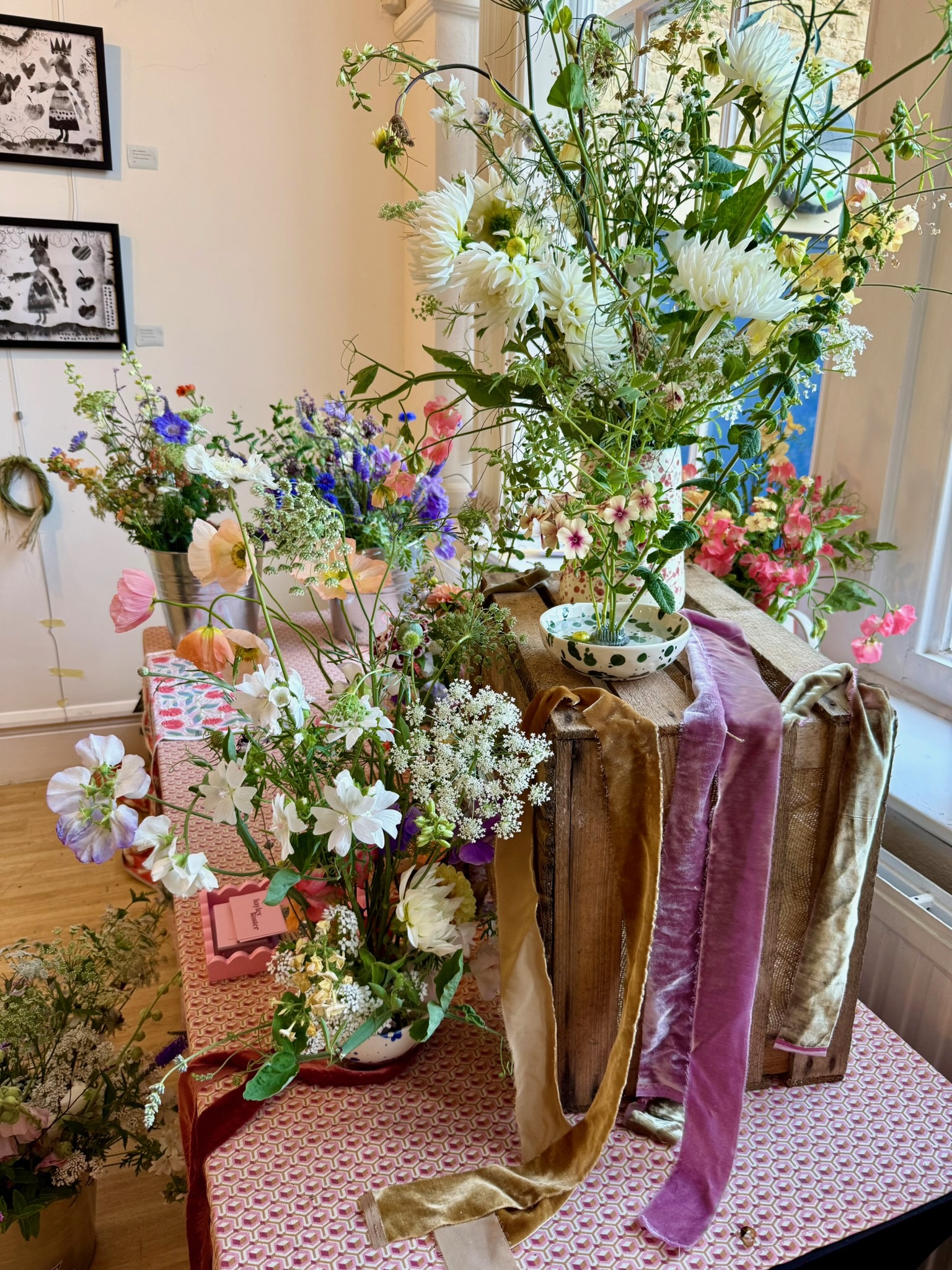 Large workshop display with wildflowers, dahlias and vintage crates